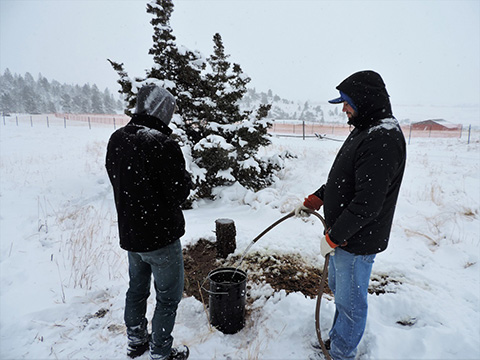 Hydrogeology Students working in a very snowy field