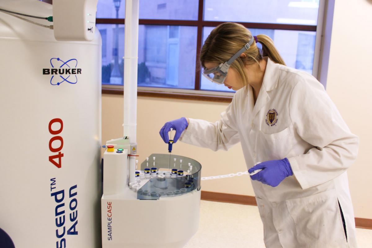 400 MHz Bruker NMR and Meghan Benda, a 2015 chemistry graduate, in the Carroll College Chemistry Integrated Lab