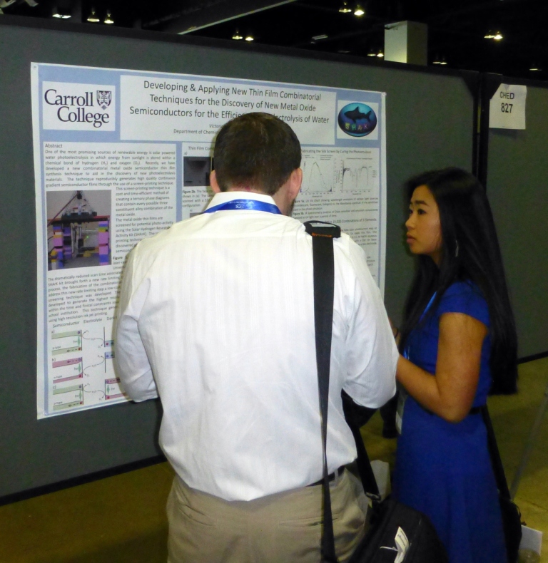 Victoria Kong explains her research to a passer by