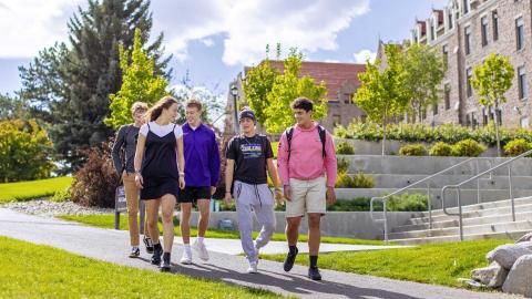 Students Walking Through Campus