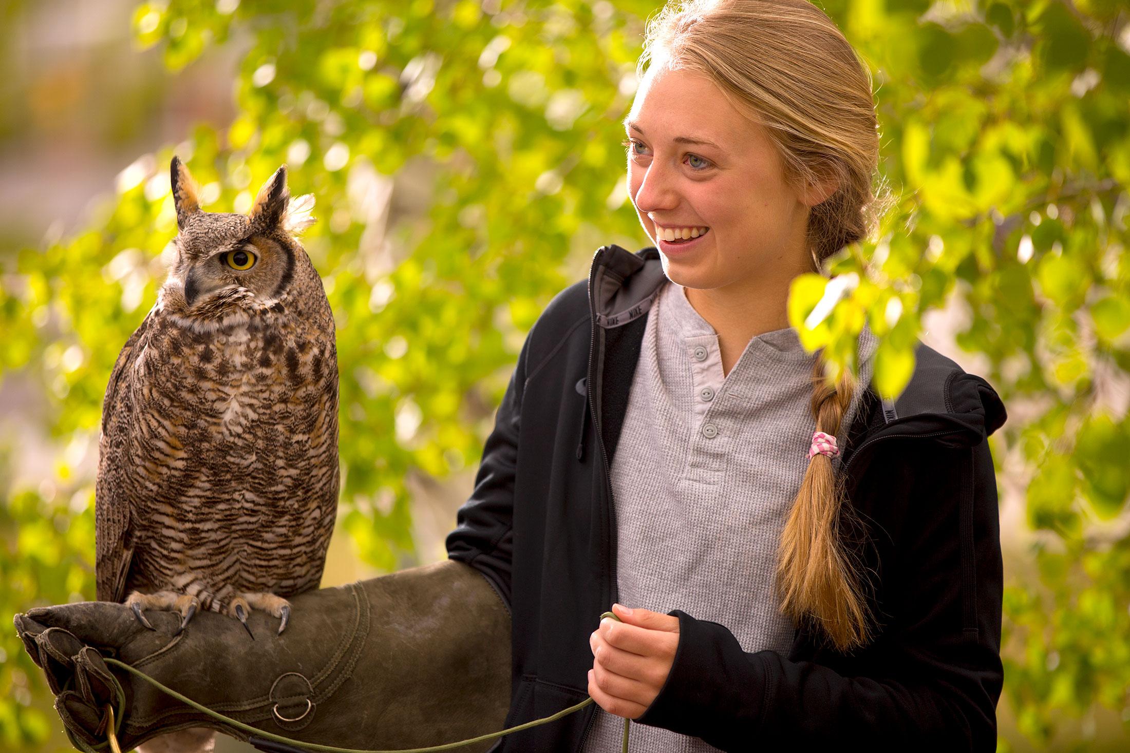 Sarah Roberts holding an owl