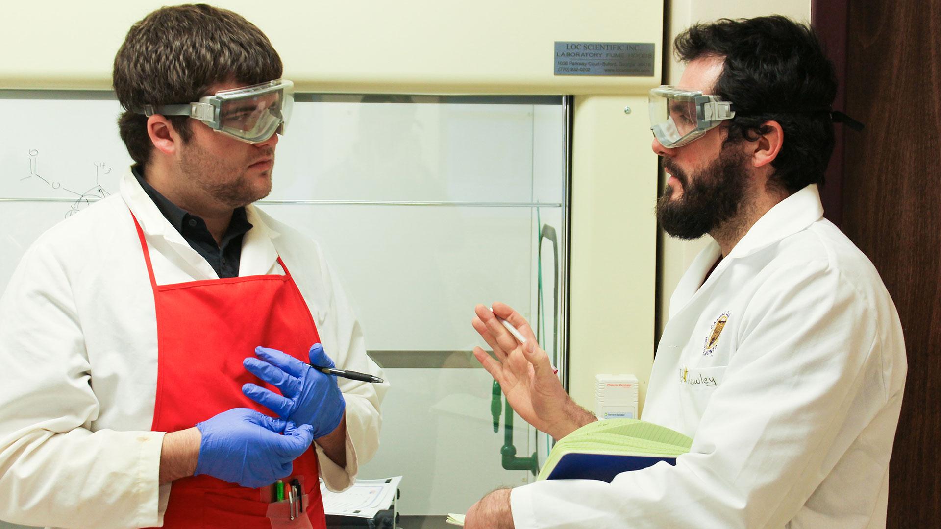 Dr. Rowley works with a student in the E.L.Wiegand Integrated Research and Learning Lab