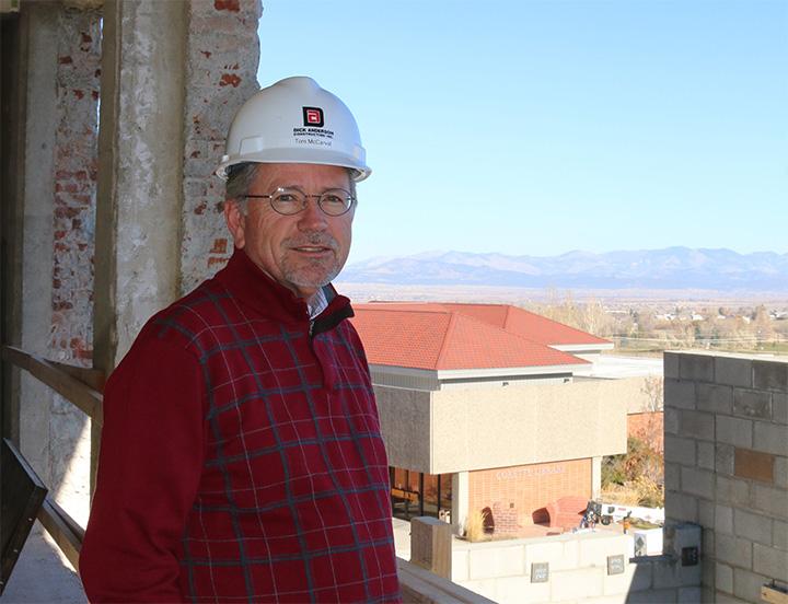 Tom McCarvel in a Hard Hat during the Chapel Construction