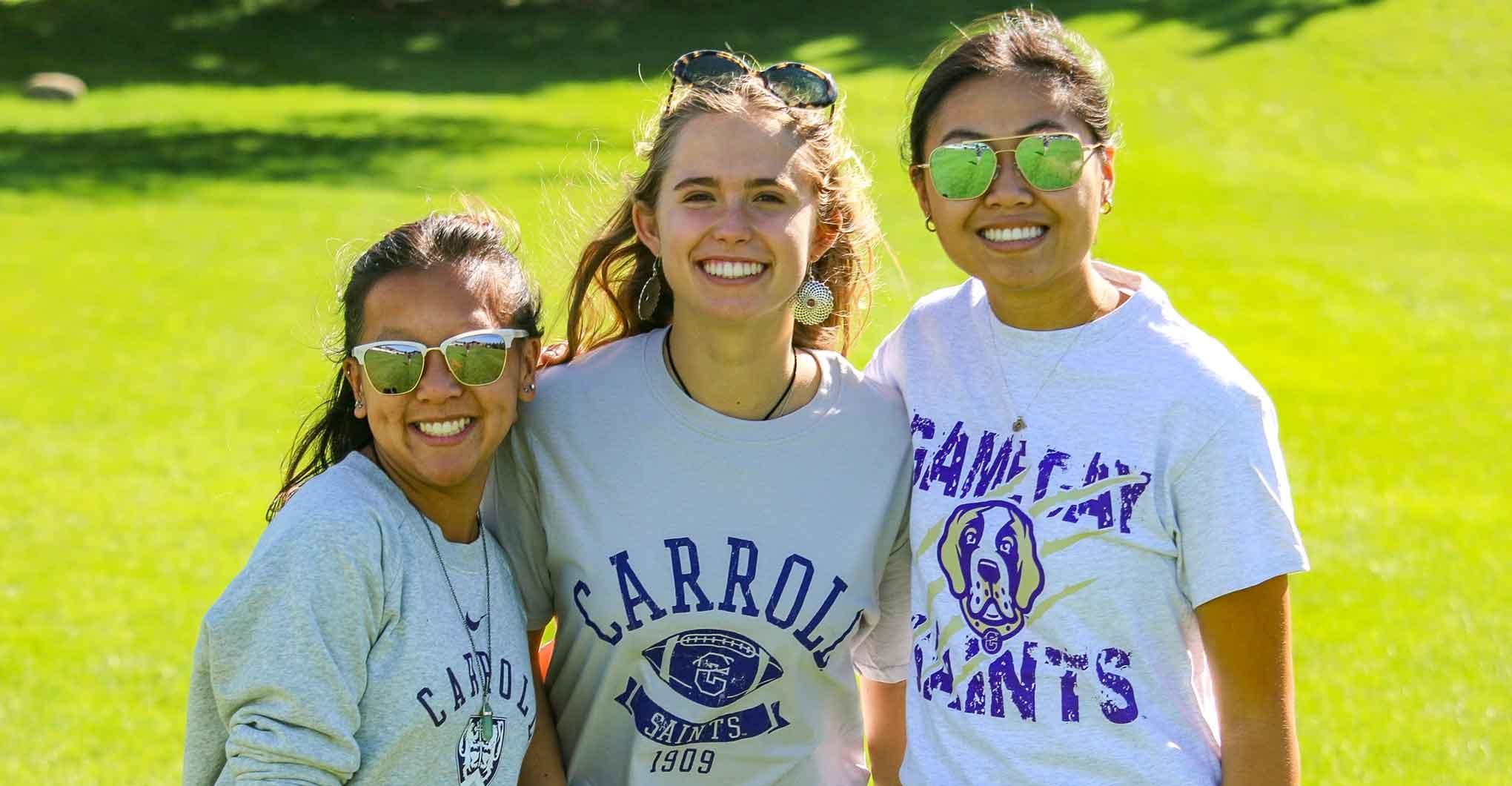 Three Carroll Students Smiling