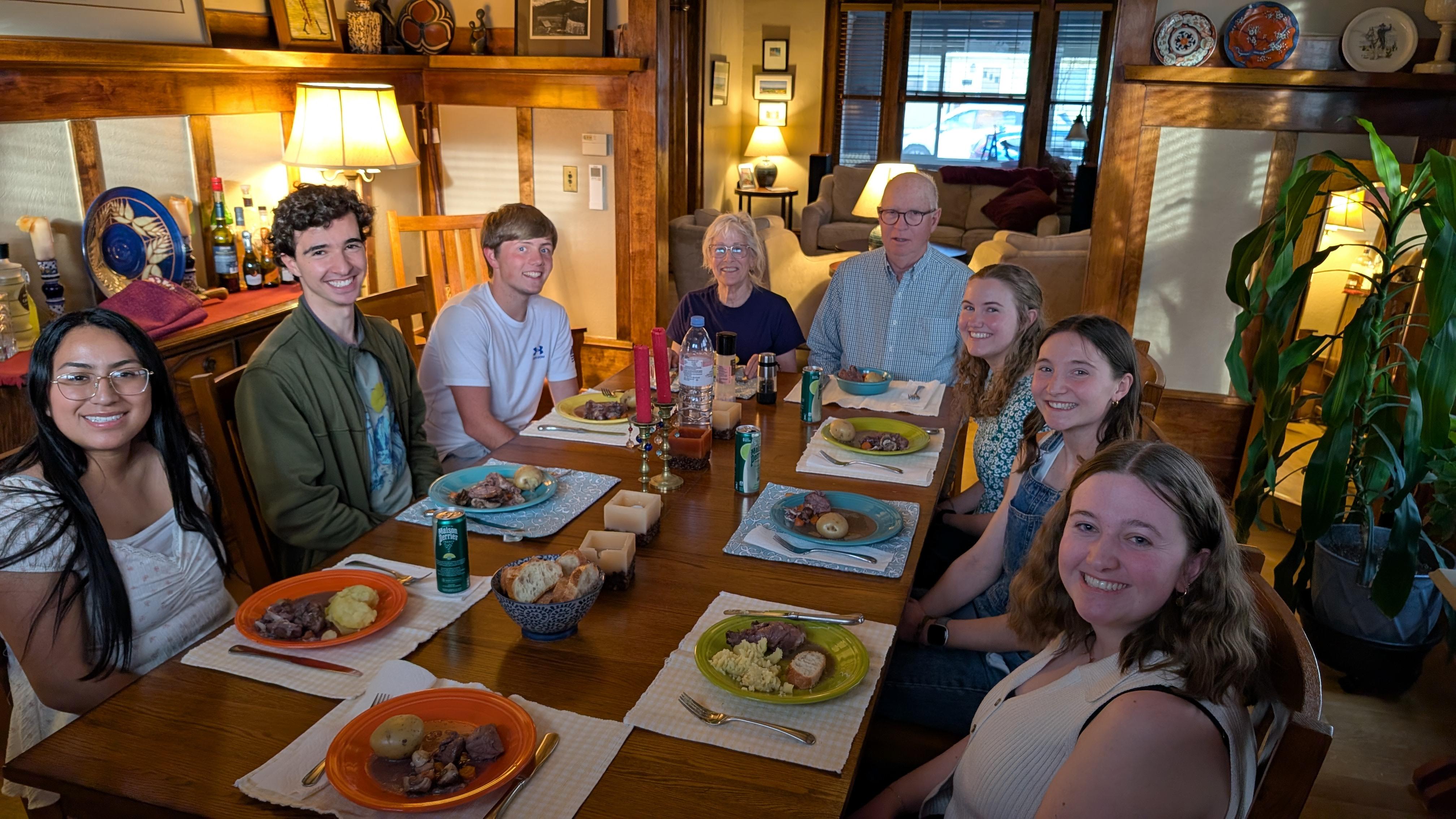 Students enjoying an authentic French dinner