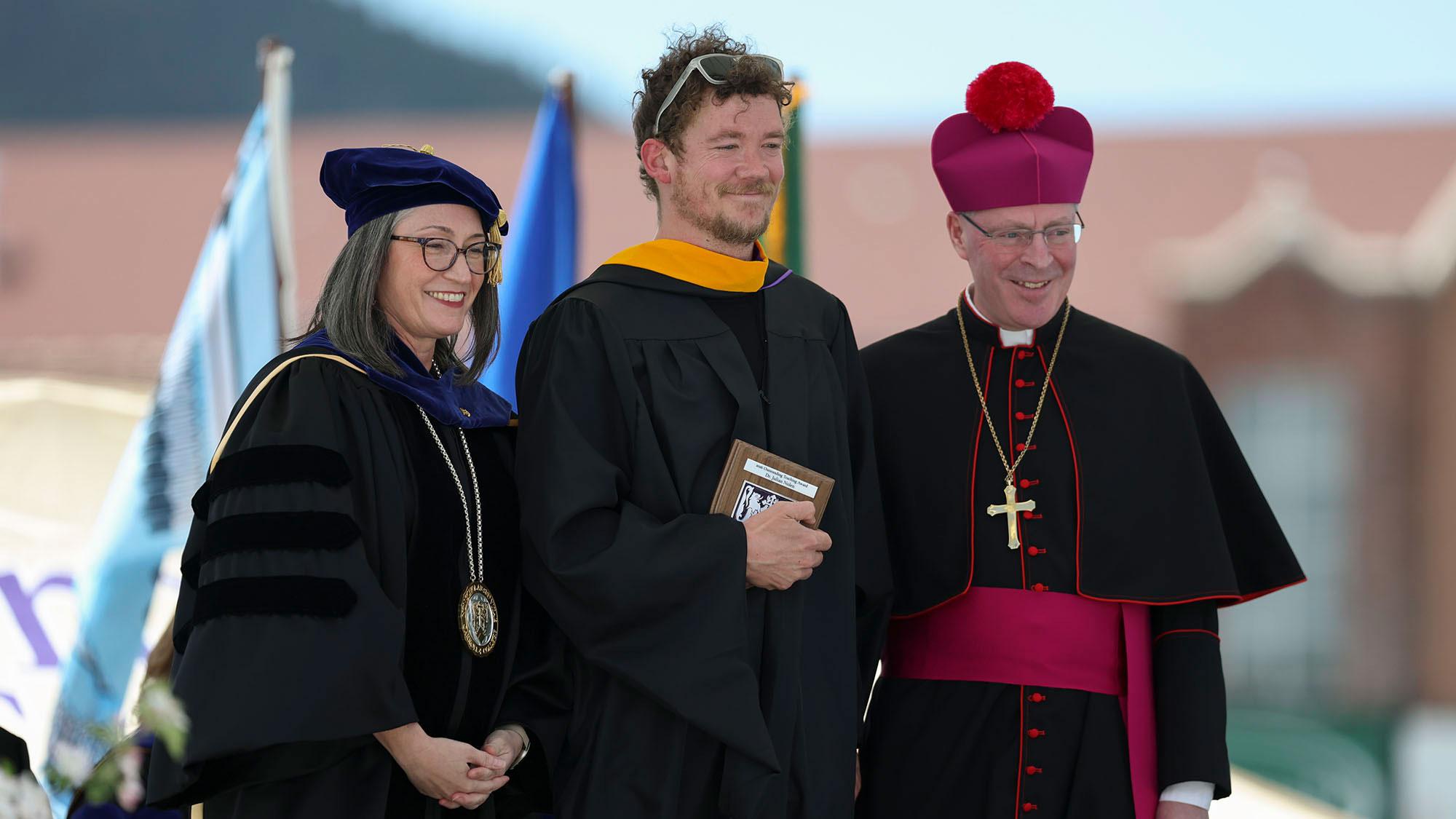 Dr. Julian Nolan (center) with Co-Presidents Dr. Jennifer Glowienka and Bishop Austin A. Vetter